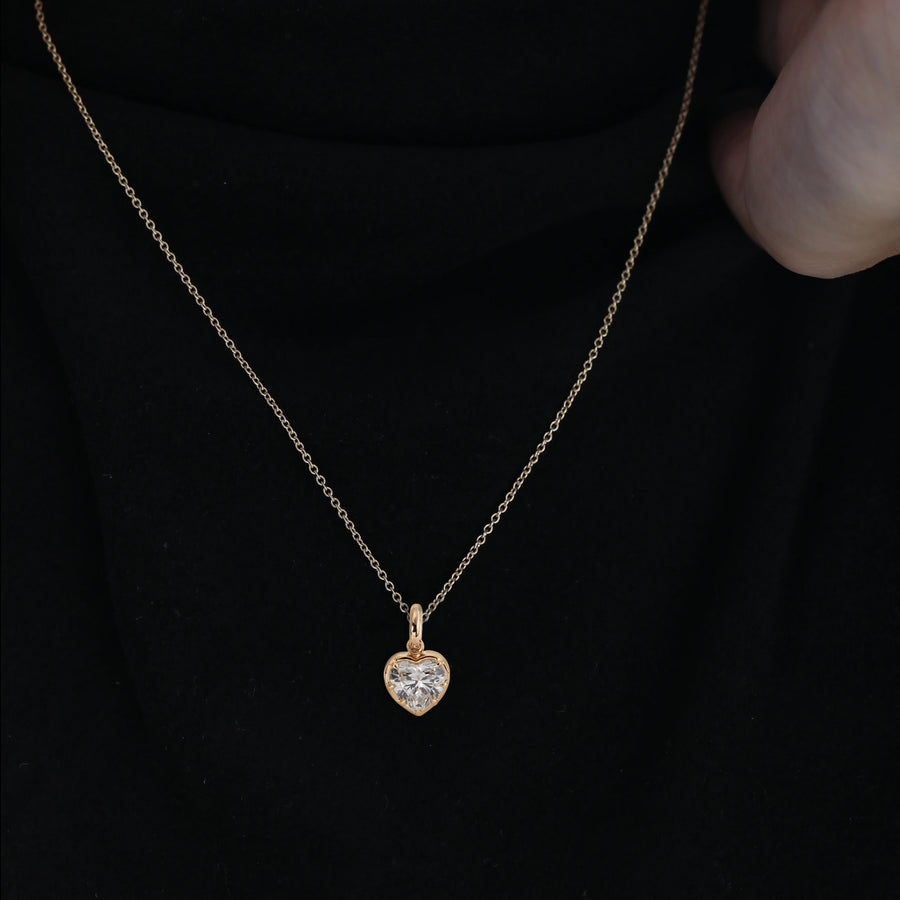 14K gold necklace with a 2-carat heart-shaped lab-grown diamond pendant, bezel setting.