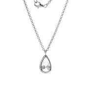 A pendant set with 6-carat pear-shaped lab-grown diamonds, featuring a three-prong setting and a Rollo chain.